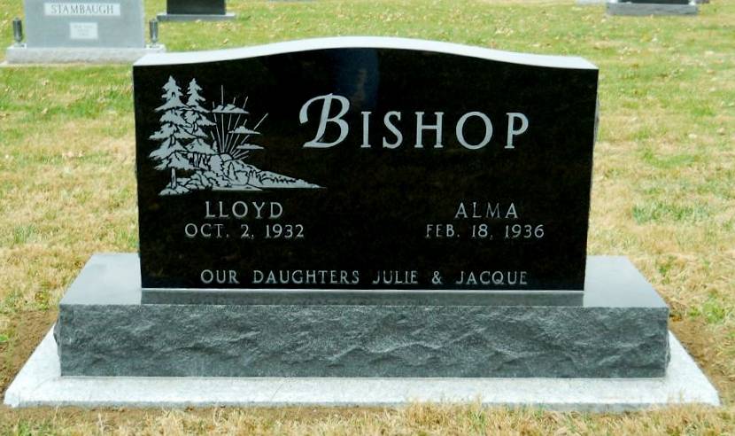 Black granite monument with custom scene, preneed